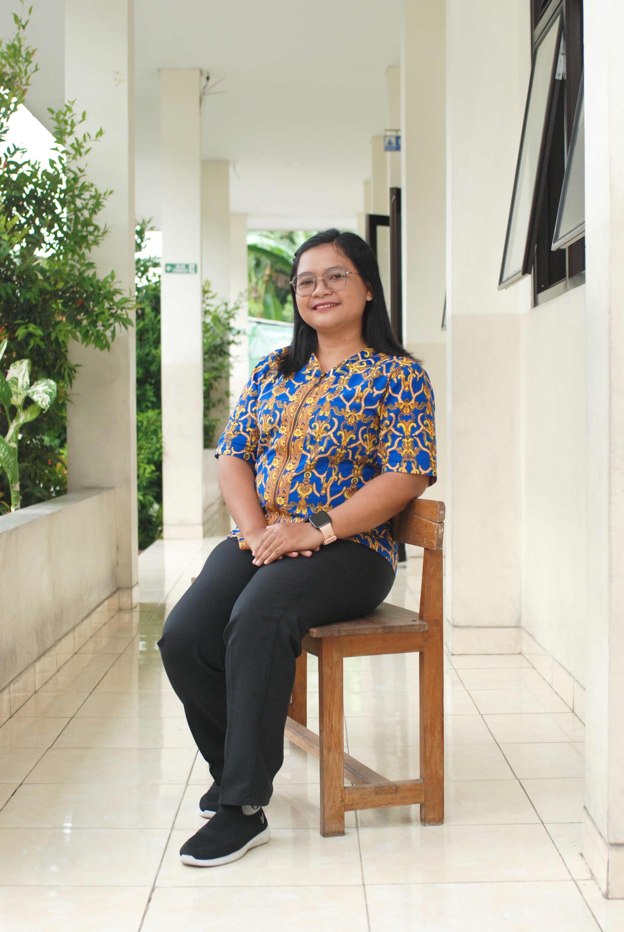 Angela Okti Paula, S.Pd